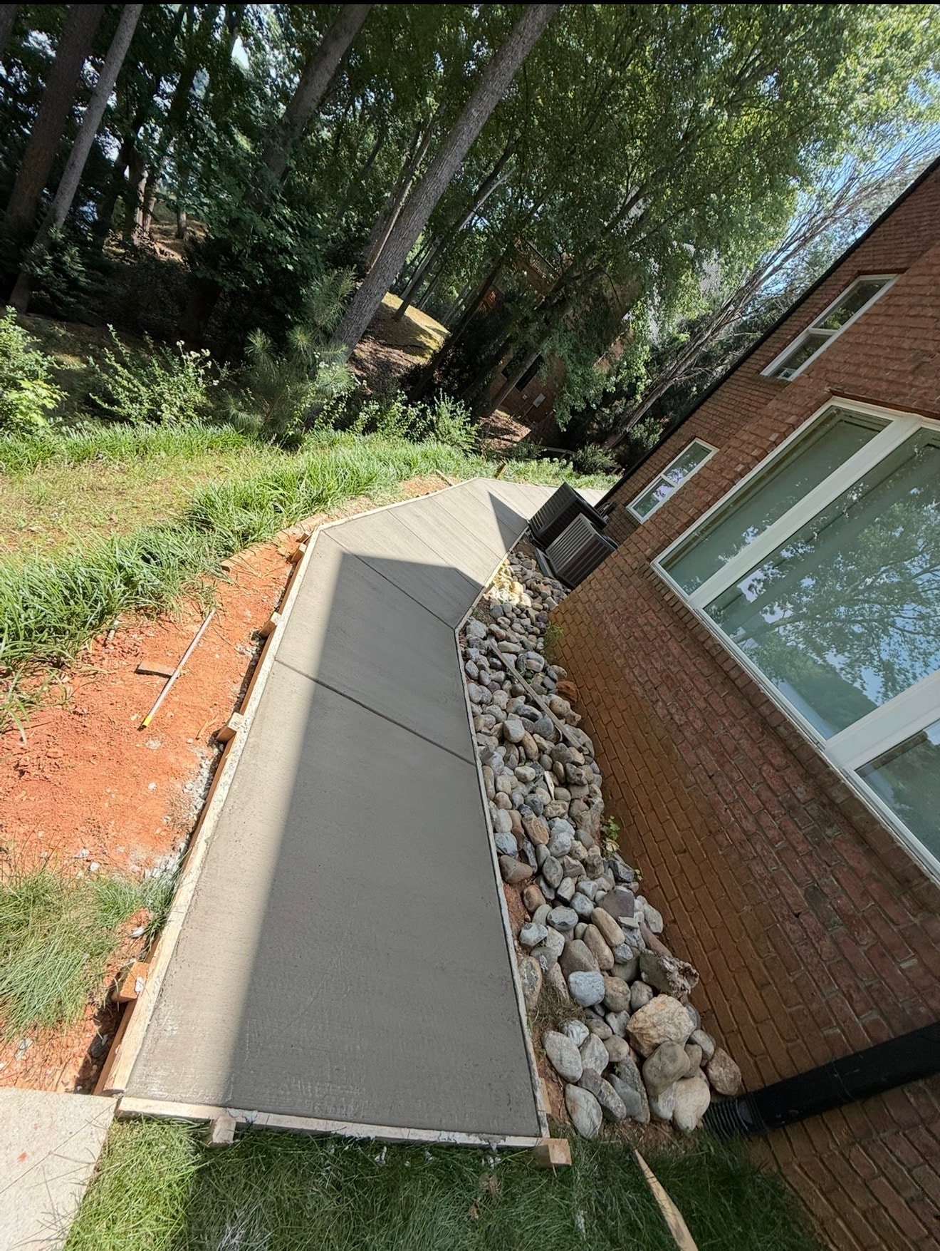 Brick house with concrete patio