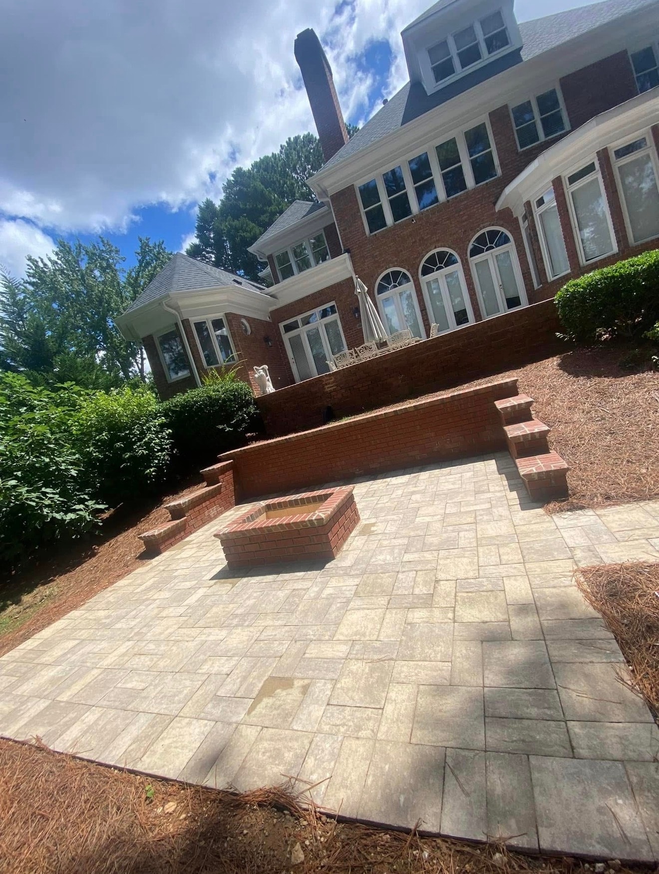 Brick home with patio courtyard